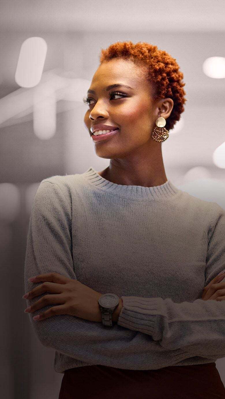 Professional woman in an office setting, representing leadership readiness and future potential.