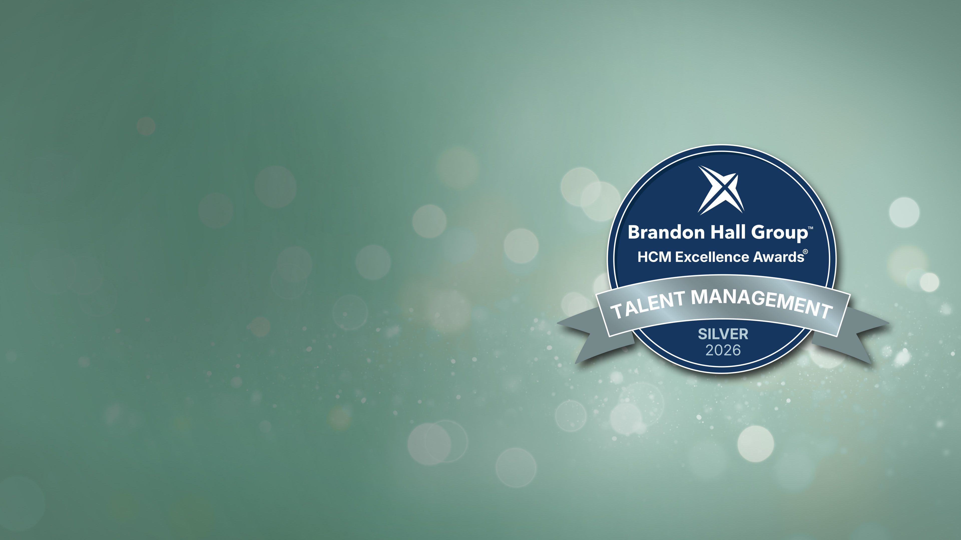 Brandon Hall Group Silver HCM Excellence Award badge recognizing RHR and EllisDon leadership development excellence.
