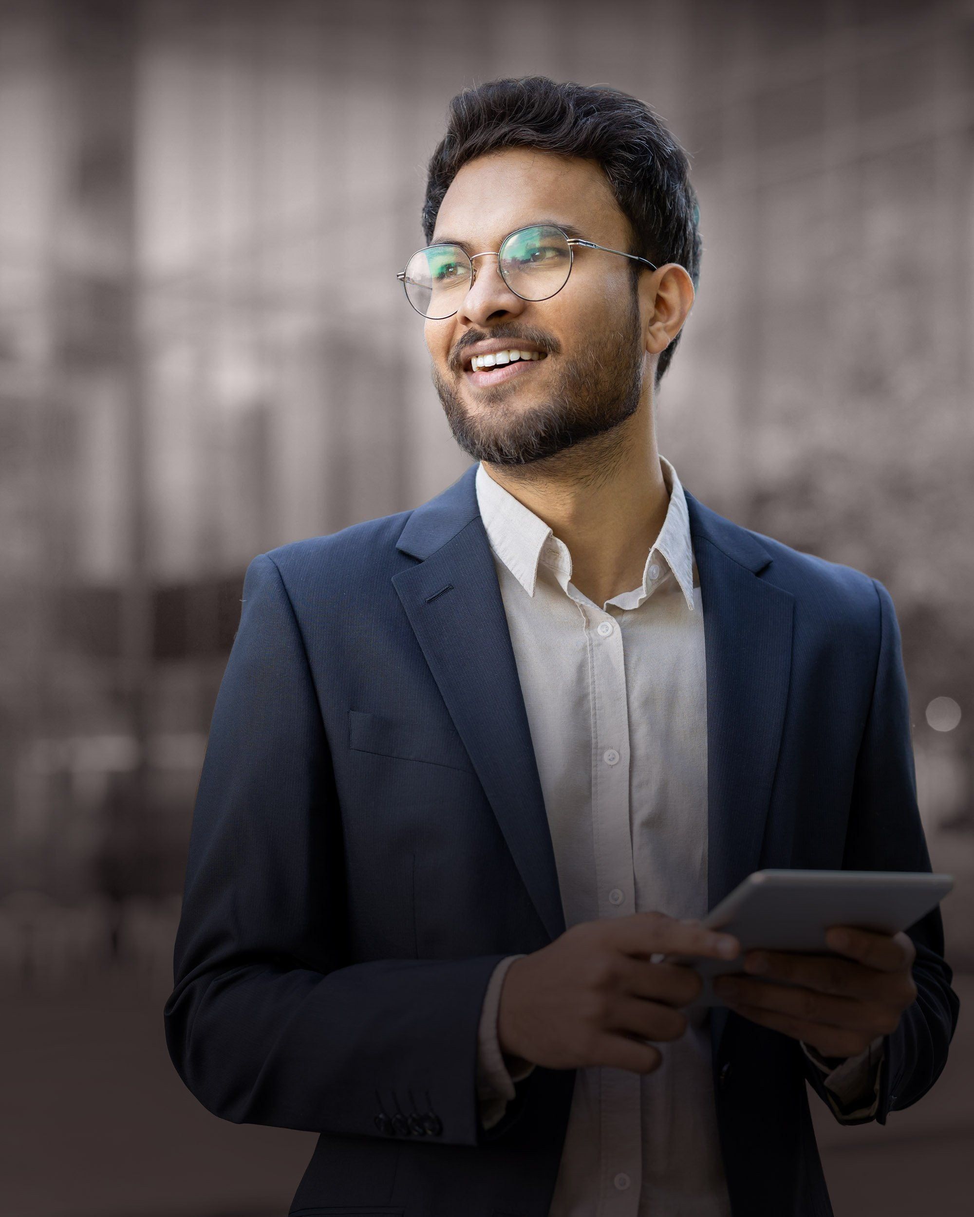 Professional looking ahead while holding a tablet, illustrating RHR’s strategic talent solutions and its focus on aligning leadership, talent, and business strategy to drive organizational performance and long-term success.