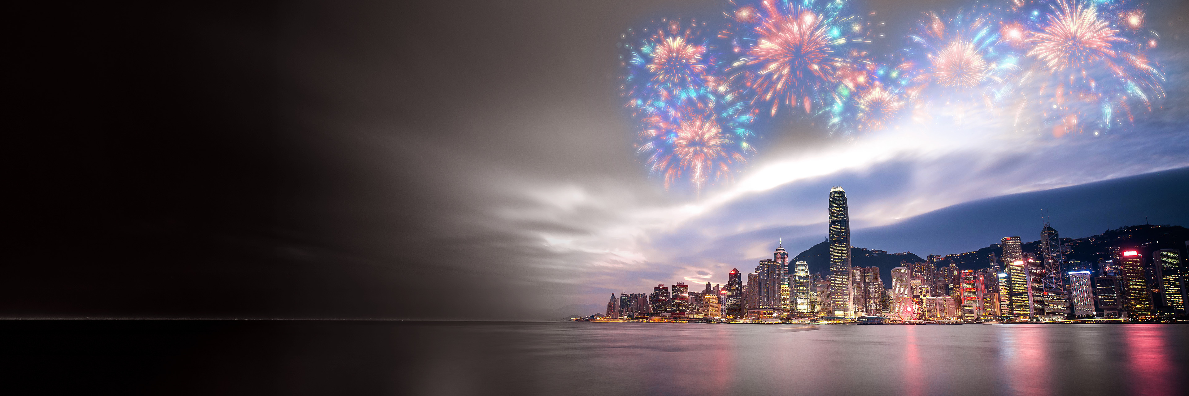 Panoramic city skyline with fireworks, representing RHR’s award-winning leadership solutions and recognition from industry organizations.
