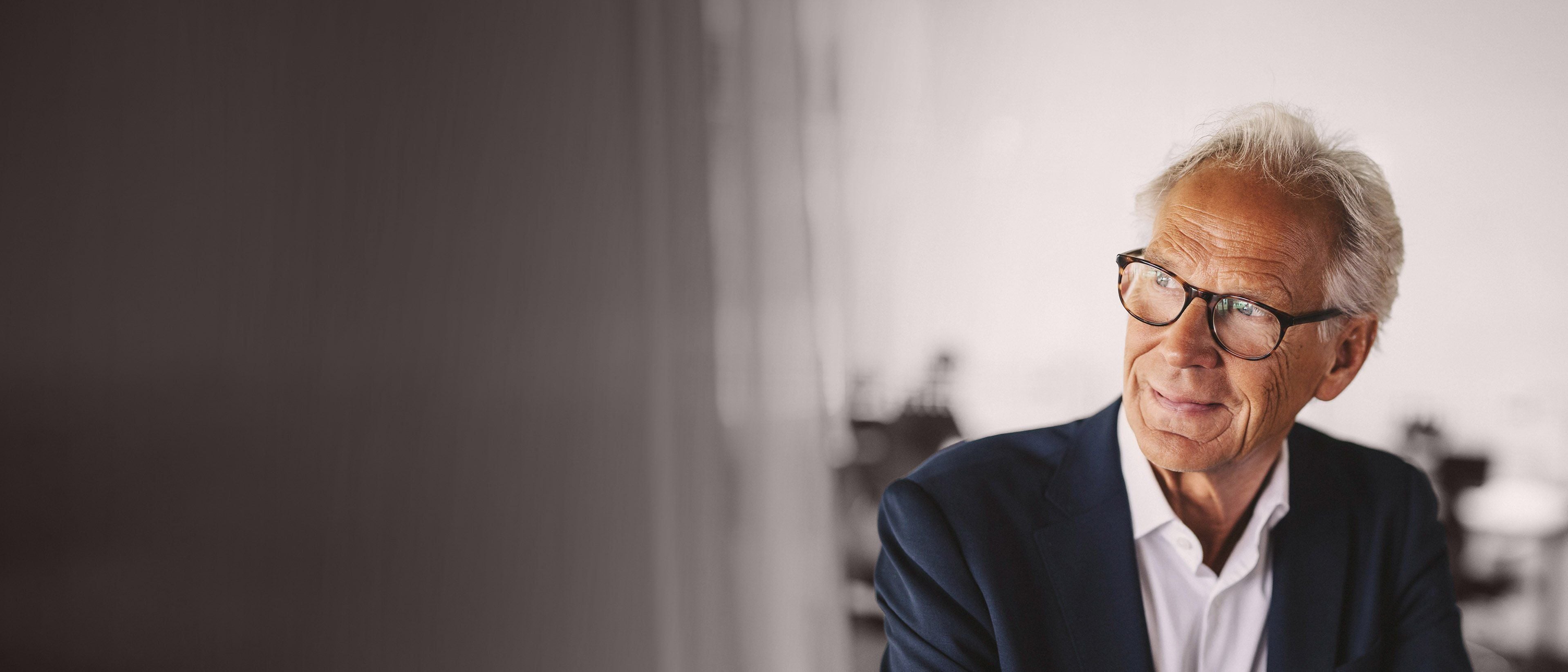 Wide banner image of a senior business executive in a professional setting, representing strategic leadership, governance, and RHR’s CEO and Board Advisory services.