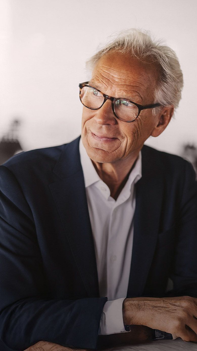 Image of a senior business executive in a professional setting, representing strategic leadership, governance, and RHR’s CEO and Board Advisory services.