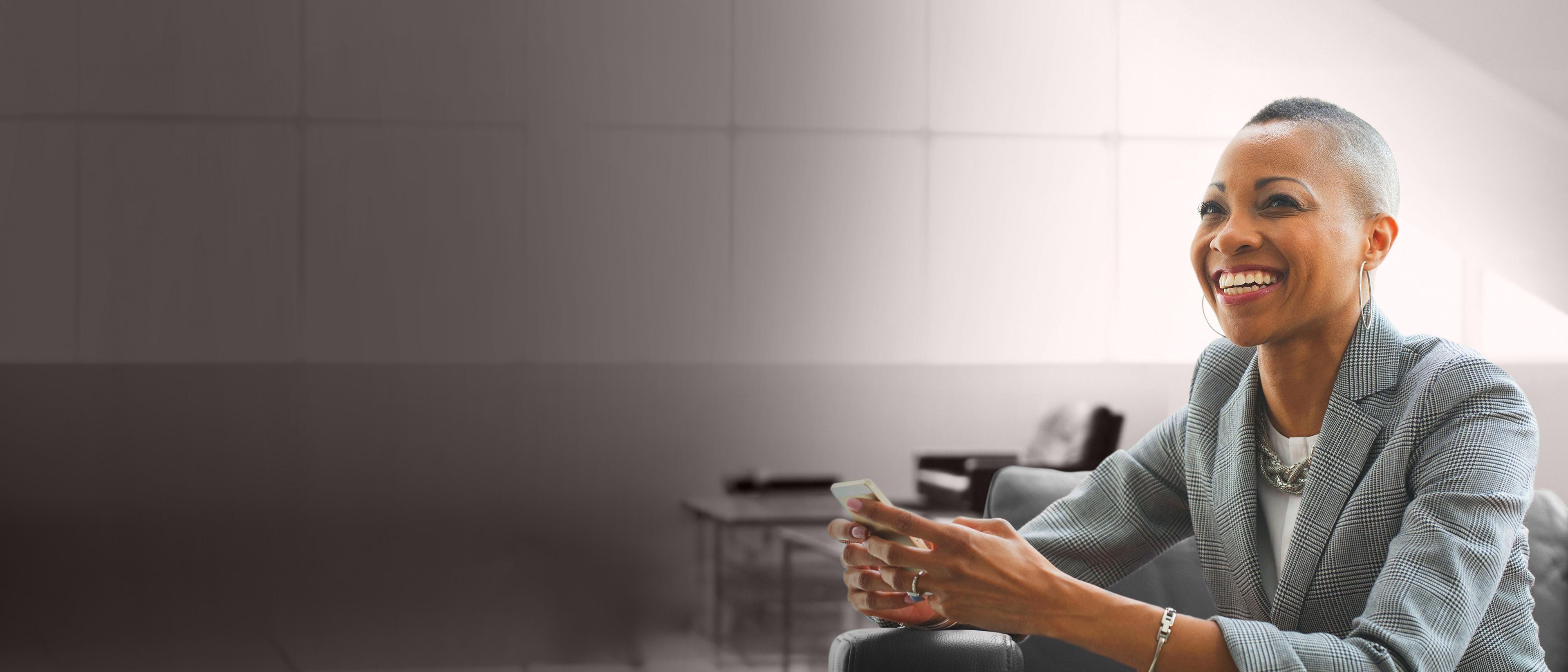 Wide banner image of a business professional in discussion, representing leadership role definition, talent alignment, and succession readiness through RHR’s Succession Planning and Role Profiling Solutions.