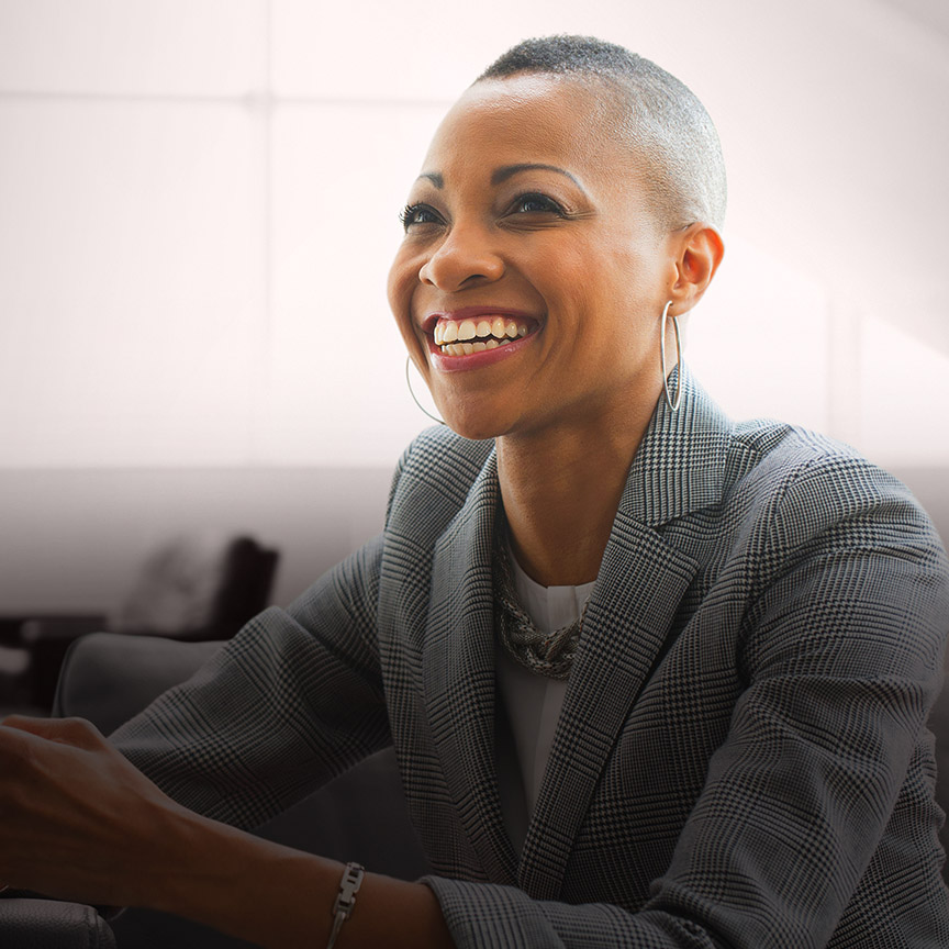 Role profiles image of a business leader in discussion, representing clear leadership expectations, succession planning, and talent development.
