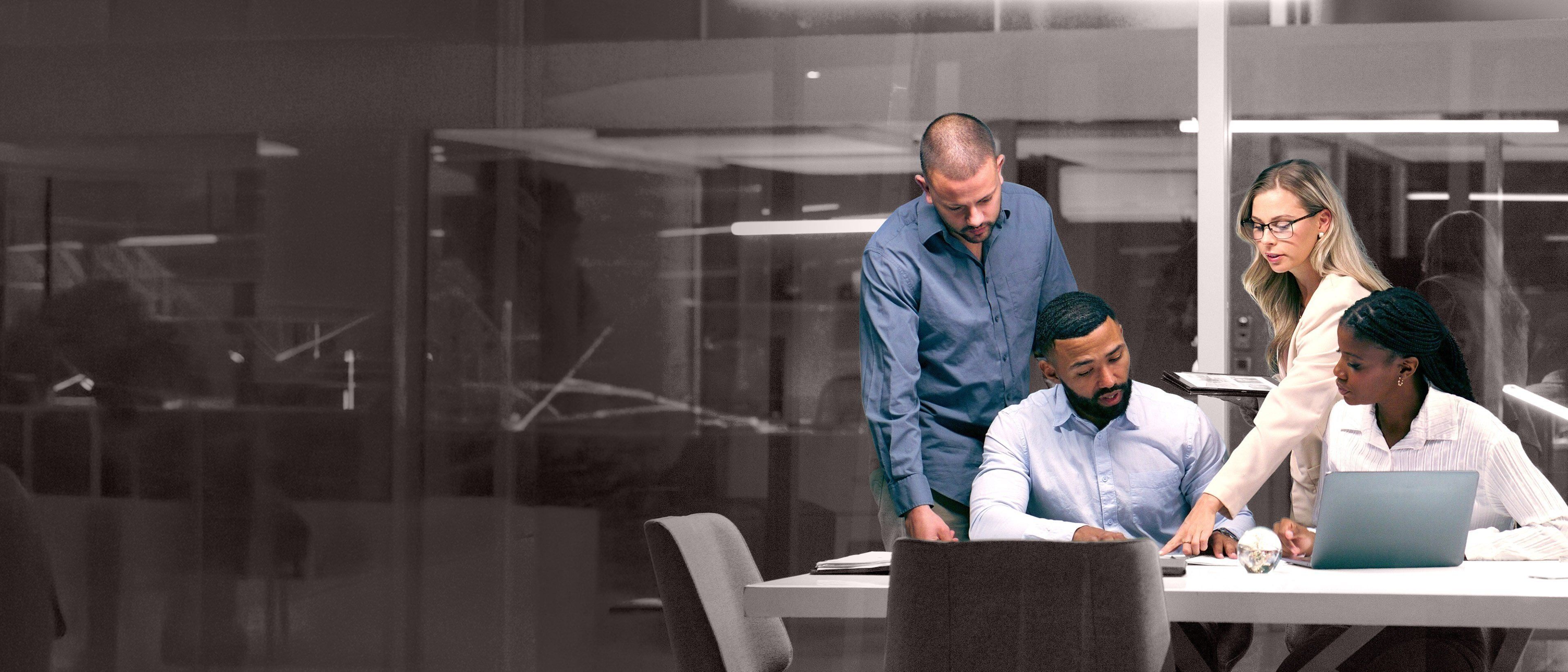 Wide banner image of business professionals collaborating during a planning session, representing team formation, leadership alignment, and RHR’s Launching New Teams Solutions.